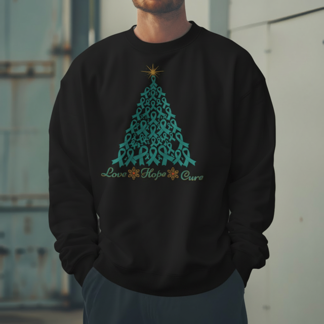 Black sweatshirt with teal tree design and text 'Love Hope Cure' worn by a person.