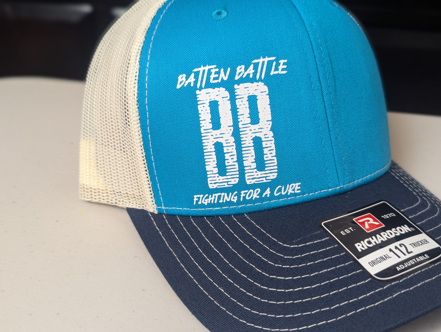 Trucker Hat - Batten Battle Fighting For a Cure - Blue Teal/Birch/Navy - Batten Battle Apparel