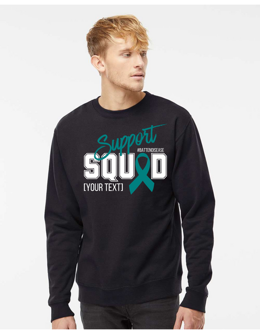 Man wearing a black sweatshirt with 'Support Squad' text and teal ribbon design on a white background