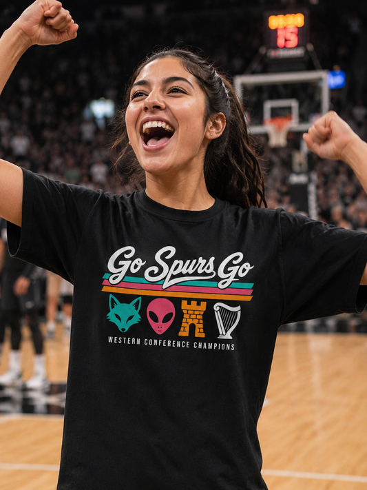 Person wearing a black t-shirt with 'Go Spurs Go' and sports team logos on a basketball court.