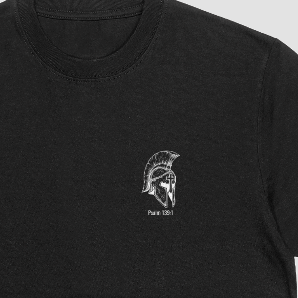 Black t-shirt with a small logo on the chest against a white background